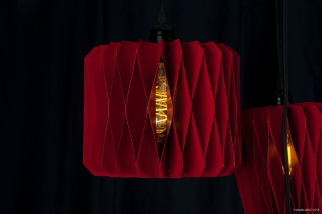 red paper lantern on black background