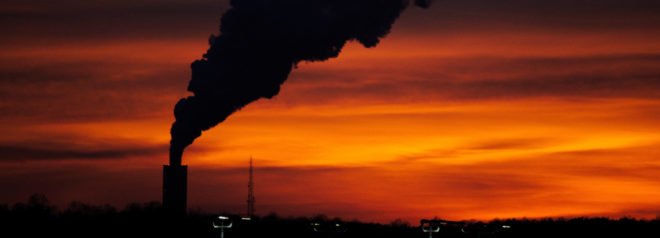 Factory smoke during sunset