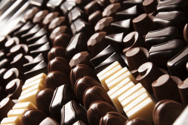 lines of dark, milk and white chocolate candies