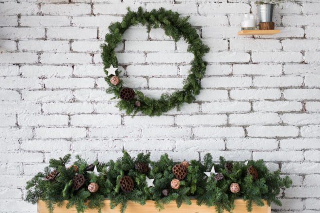 wood mantle with evergreen garland