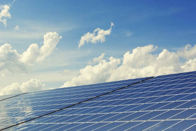 solar panels against a blue sky