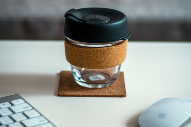 glass coffee cup with cork sleeve