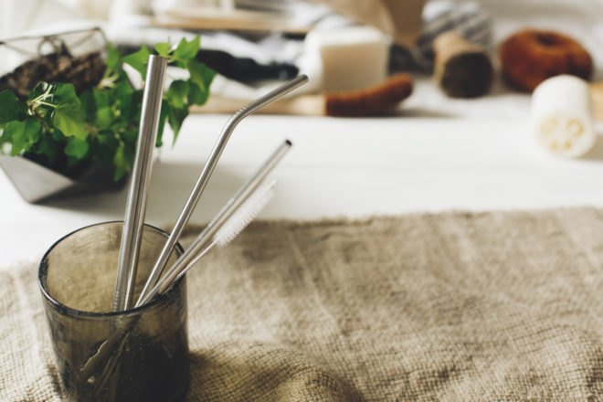 glass cup with stainless steel straws