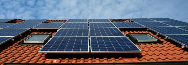 Solar panels on a Spanish-style roof