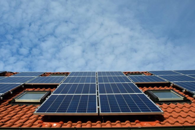 Solar panels on a Spanish-style roof