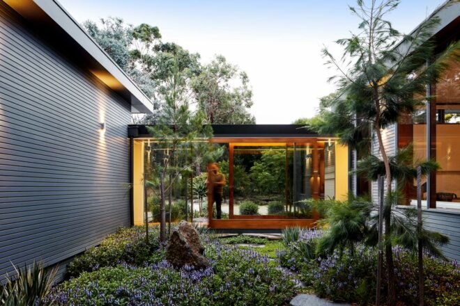 view of lush garden in the center of modernized home