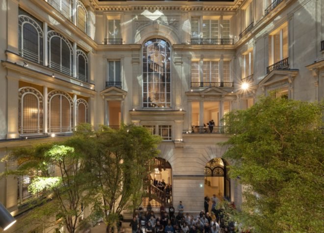 interior of Apple Champs-Élysées with reflection of mirrored roof