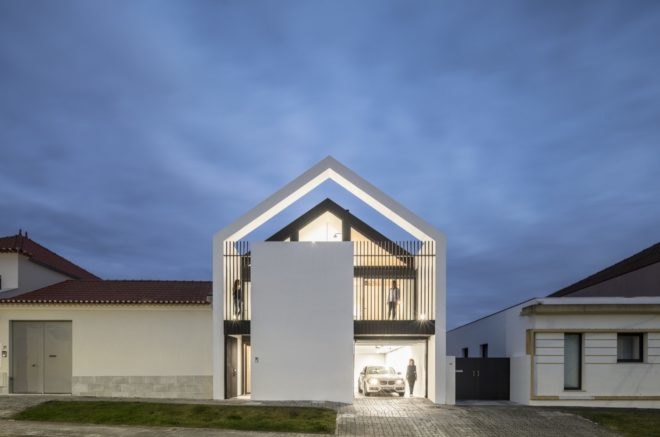 white home with gabled roof