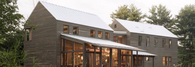 gray home with gabled roofs