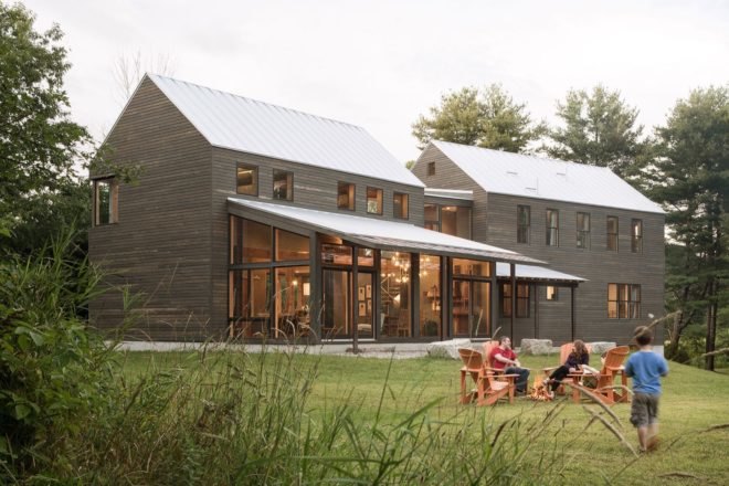 gray home with gabled roofs