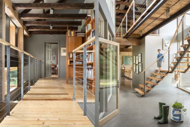 gray wood with wood floors and dark wood ceiling beams