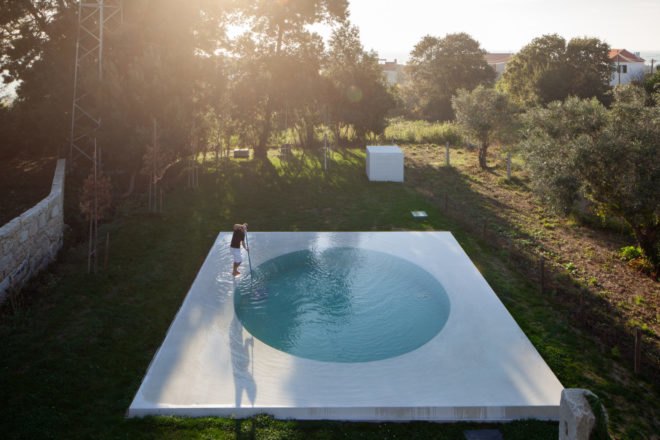 round pool on all white square deck