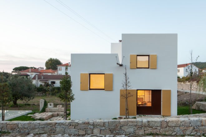 cubic block-style home with large windows