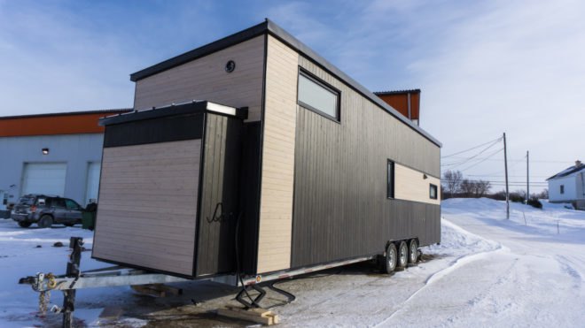 two-tone tiny home on wheels