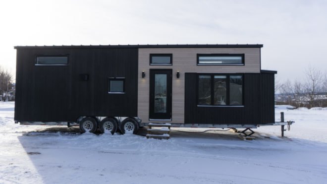 two-tone tiny home on wheels