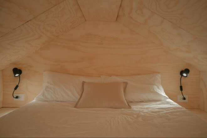 bed with white comforter
