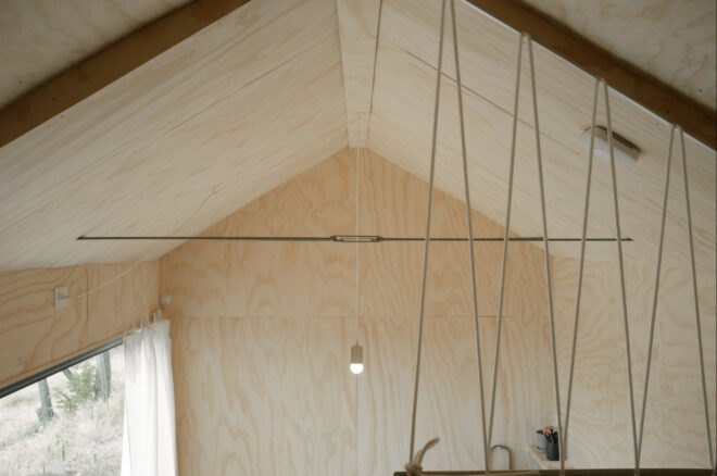 interior living space with pitched ceiling