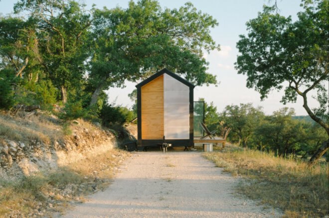 tiny cabin on gravel path