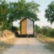 tiny cabin on gravel path