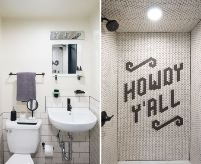 black and white tiled bathroom with wording