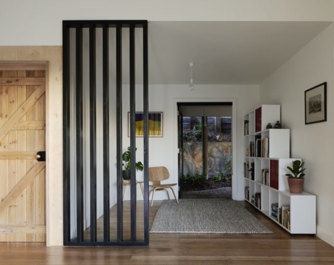 partial screen separating a small sitting area
