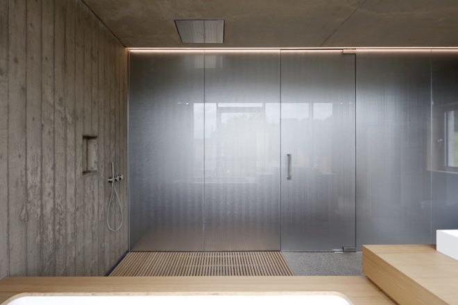 open shower in a gray bathroom