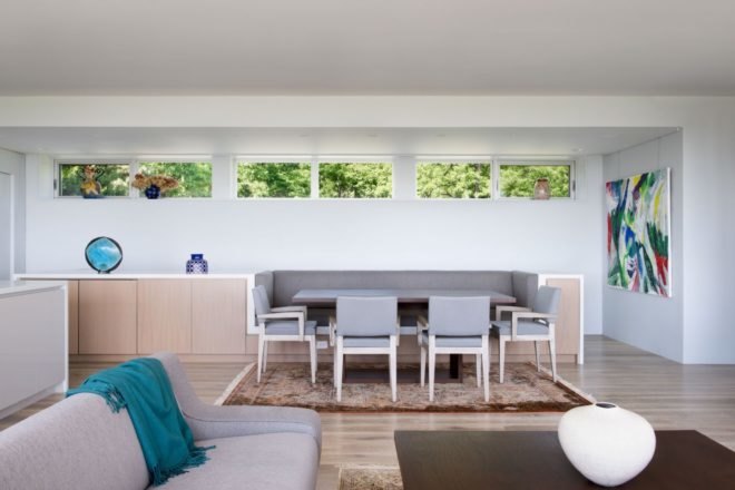 gray dining table with gray bench seating
