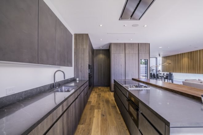 kitchen interior of home with wood countertops and cabinets
