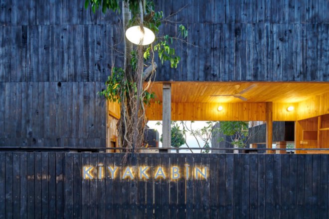 bamboo sign that reads "Kiyakabin Resort"