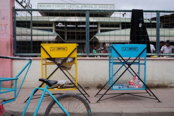 blue and yellow recycling bins