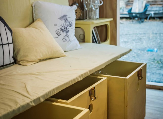 a sofa with pull out drawers