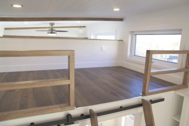wooden sleeping loft with window