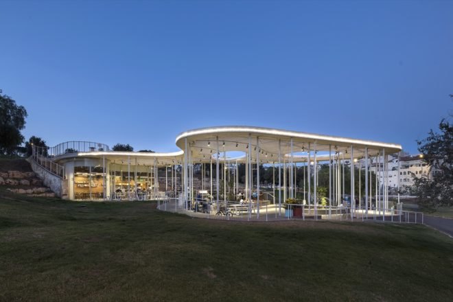 cafe with white pillars and roof in park