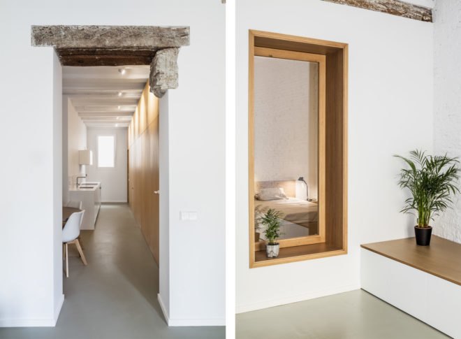 bedroom doorway and small window on wall give sight to the bedroom