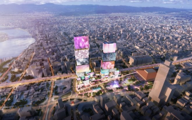 aerial rendering of towers with media screens as the facades