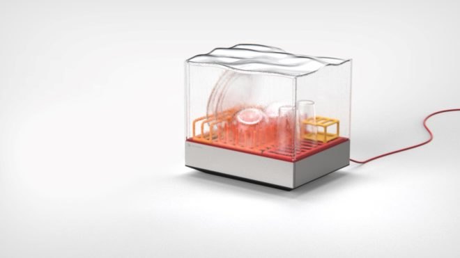 dishes inside a small orange and gray dishwasher