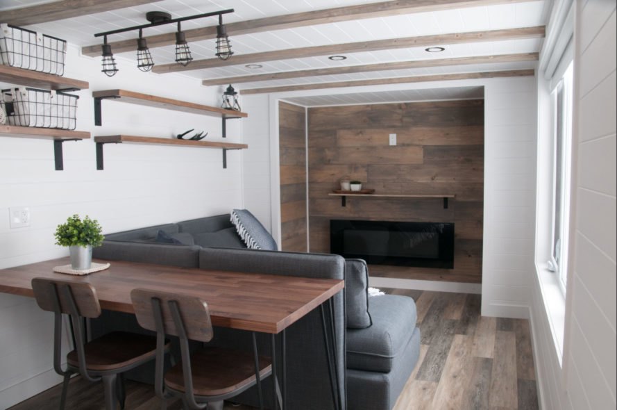 tiny home living space with grey sofa