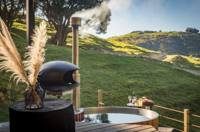 outdoor deck with grill and hot tub