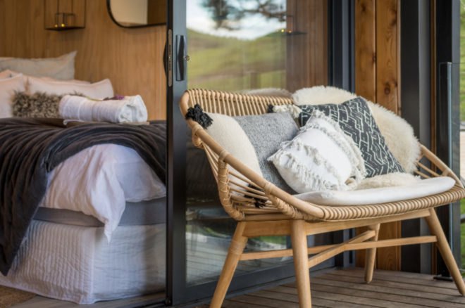 wicker bench outside glass door