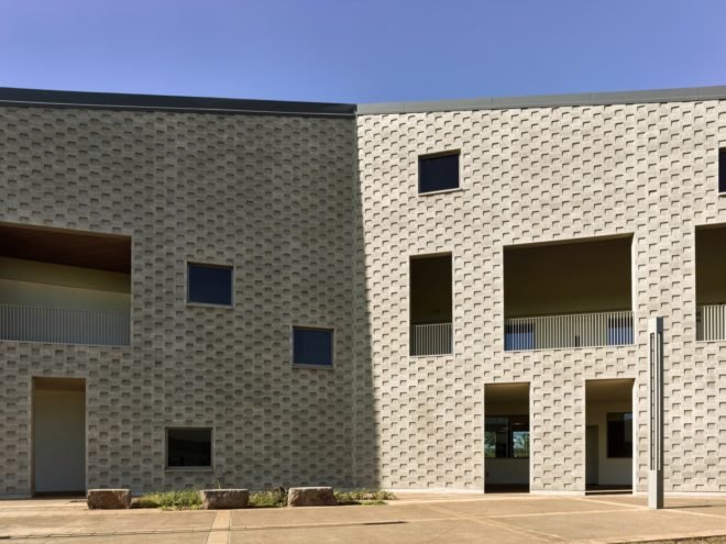textured gray facade of a building