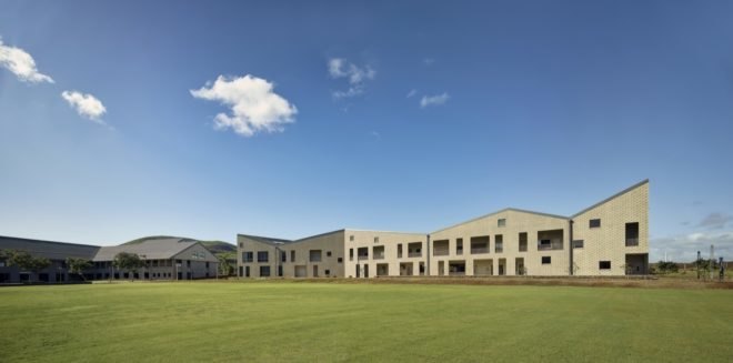 gray building with jagged roof