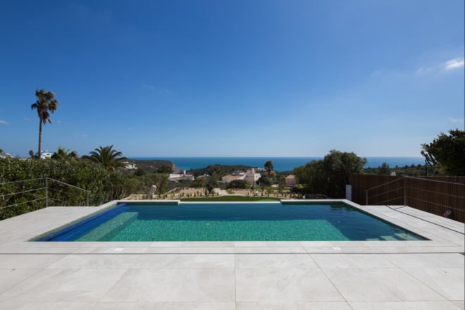 swimming pool facing the ocean