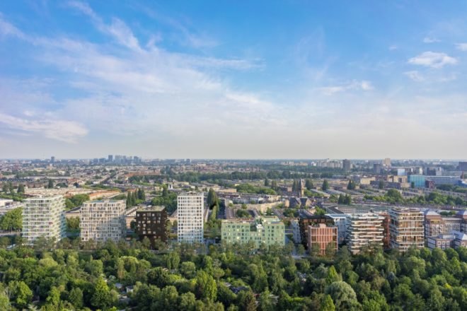 illustration of housing buildings surrounded by greenery and trees