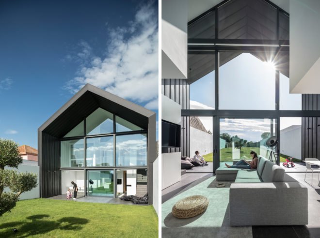 On the left, black gabled home. On the right, living room with tall ceilings and glass wall.