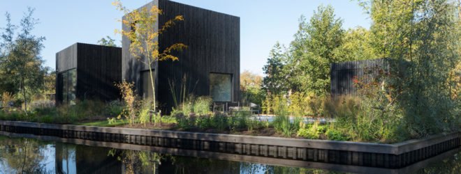 all black home next to water