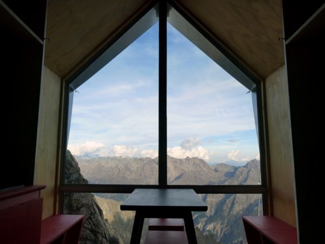 glass wall revealing mountain views