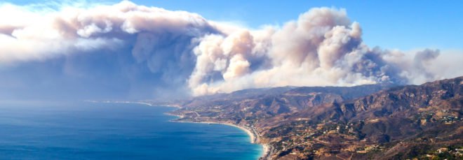 Smoke from Woolsey fire rising over California mountains and Pacific Ocean