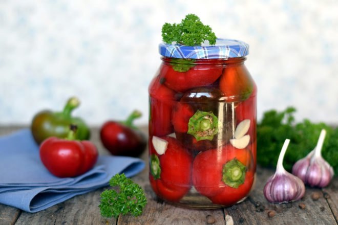 pickled peppers in a glass jar