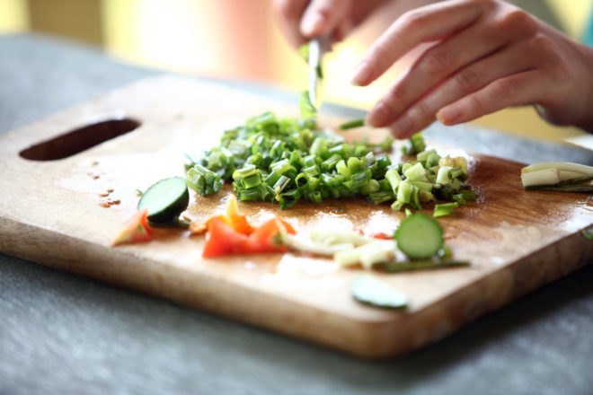 cutting board with chopped vegetables