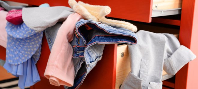 open drawers full of clothing